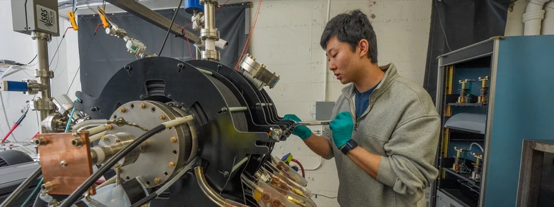 Marathon Fusion researcher assembling fusion hardware in the lab
